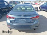 ✅ 2014 Mazda 6 i Grand Touring • VIN: JM1GJ1W62E1126147 • Lot: 43697289. Listed on IAAI with 140,014 mi. Free auction sales archive from the USA and detailed vehicle history report at DreamBid. Image 16.