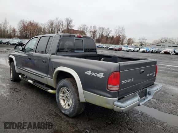 2004 Dodge Dakota SLT z VIN 1D7HG48K64S556101, wystawiony jako Copart lot #83773434 z przebiegiem Nie podano mil oraz Nie do naprawy • Non repairable. Historia ofert i sprzedaży dostępna na DreamBid. Obrazek 2.