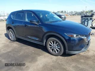 ✅ 2022 Mazda CX-5 S Preferred • VIN: JM3KFBCM6N0559388 • Lot: 42237967. Listed on IAAI with 52,143 mi. Free auction sales archive from the USA and detailed vehicle history report at DreamBid. Image 1.