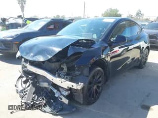 ✅ 2022 Tesla Model Y Long Range • VIN: 7SAYGDEE8NF346352 • Lot: 42649343. Listed on IAAI with 36,799 mi. Free auction sales archive from the USA and detailed vehicle history report at DreamBid. Image 2.