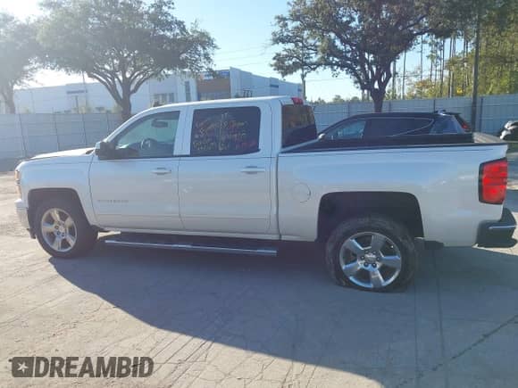2015 Chevrolet Silverado 1500 LT z VIN 3GCPCREC6FG332798, wystawiony jako IAAI lot #43461490 z przebiegiem 57 078 mil mil oraz . Historia ofert i sprzedaży dostępna na DreamBid. Obrazek 14.