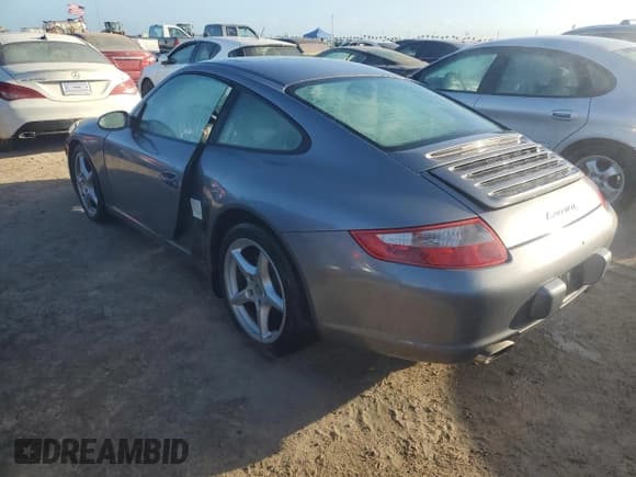 ✅ 2006 Porsche 911 Carrera • VIN: WP0AA29976S716891 • Lot: 73789914. Listed on Copart with Not provided. Free auction sales archive from the USA and detailed vehicle history report at DreamBid. Image 2.