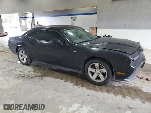 ✅ 2012 Dodge Challenger SXT • VIN: 2C3CDYAG9CH180210 • Lot: 74031254. Wystawiony na Copart z przebiegiem 184 028 mil. Bezpłatny archiwum sprzedaży aukcyjnych z USA i szczegółowy raport historii pojazdu na DreamBid. Zdjęcie 4.