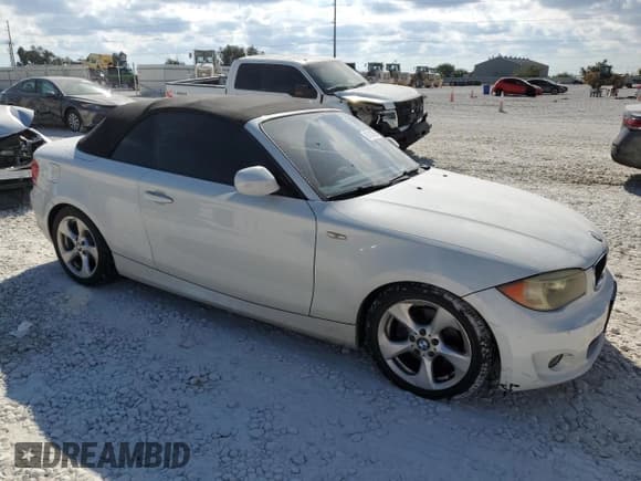 ✅ 2012 BMW 1 Series 128i • VIN: WBAUL7C53CVM82735 • Lot: 87107595. Listed on Copart with 144,972 mi. Free auction sales archive from the USA and detailed vehicle history report at DreamBid. Image 4.