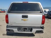 ✅ 2015 Chevrolet Colorado 4WD Z71 • VIN: 1GCHTCE37F1186881 • Лот: 84638415. Опубликован ранее на Copart с пробегом 95 793 миль. Бесплатный доступ к архиву аукционных продаж из США и подробный отчёт об истории автомобиля на DreamBid. Изображение 6.