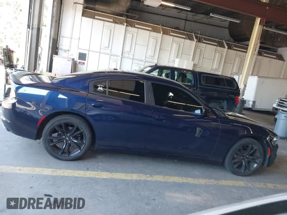 ✅ 2017 Dodge Charger SE • VIN: 2C3CDXBG9HH537465 • Lot: 43273802. Listed on IAAI with 105,564 mi. Free auction sales archive from the USA and detailed vehicle history report at DreamBid. Image 13.