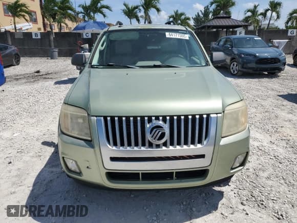 ✅ 2010 Mercury Mariner • VIN: 4M2CN8BG8AKJ11564 • Lot: 64171555. Listed on Copart with 180,034 mi. Free auction sales archive from the USA and detailed vehicle history report at DreamBid. Image 5.