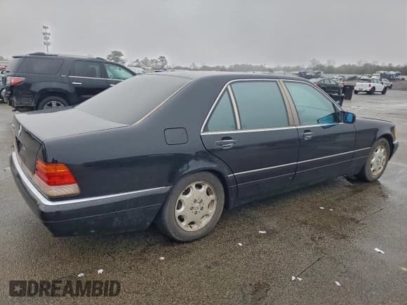✅ 1996 Mercedes-Benz S • VIN: WDBGA51E5TA295340 • Лот: 94701385. Опубликован ранее на Copart с пробегом 179 643 миль. Бесплатный доступ к архиву аукционных продаж из США и подробный отчёт об истории автомобиля на DreamBid. Изображение 3.