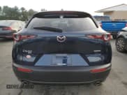 ✅ 2024 Mazda CX-30 S Premium • VIN: 3MVDMBDM2RM620260 • Лот: 85313544. Опубликован ранее на Copart с пробегом 6 877 миль. Бесплатный доступ к архиву аукционных продаж из США и подробный отчёт об истории автомобиля на DreamBid. Изображение 6.