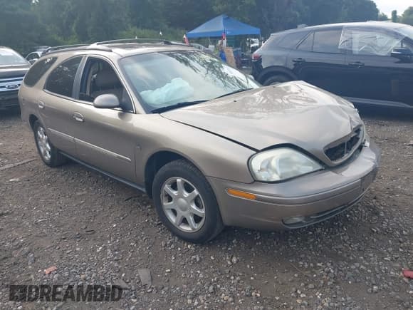 ✅ 2003 Mercury Sable LS Premium • VIN: 1MEHM59S23A613517 • Lot: 42873707. Listed on IAAI with 172,269 mi. Free auction sales archive from the USA and detailed vehicle history report at DreamBid. Image 1.