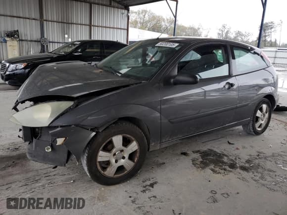 ✅ 2003 Ford Focus ZX3 • VIN: 3FAFP31Z73R178518 • Lot: 50200105. Listed on Copart with 317,147 mi. Free auction sales archive from the USA and detailed vehicle history report at DreamBid. Image 1.