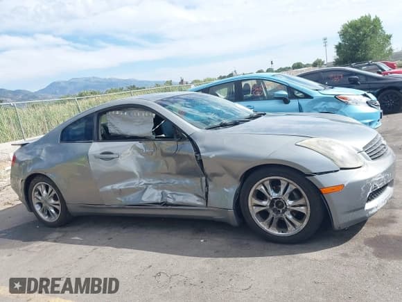 ✅ 2004 Infiniti G35 w/Leather • VIN: JNKCV54E74M822258 • Lot: 42921561. Listed on IAAI with 186,667 mi. Free auction sales archive from the USA and detailed vehicle history report at DreamBid. Image 13.