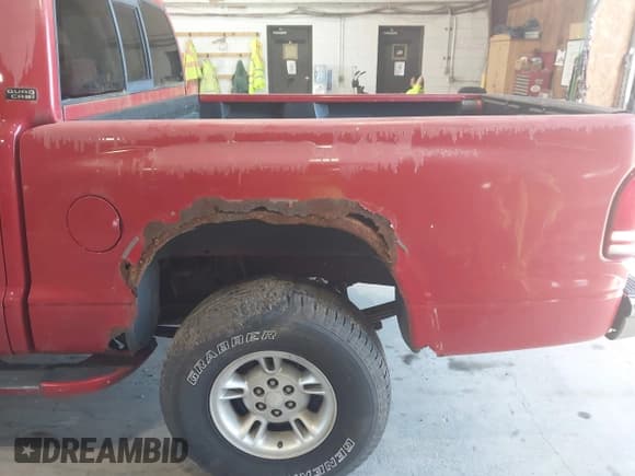 ✅ 2000 Dodge Dakota Sport • VIN: 1B7GG2AN7YS721013 • Lot: 42762045. Wystawiony na IAAI z przebiegiem 168 754 mil. Bezpłatny archiwum sprzedaży aukcyjnych z USA i szczegółowy raport historii pojazdu na DreamBid. Zdjęcie 12.