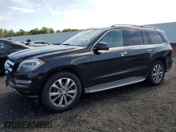 ✅ 2015 Mercedes-Benz GL 450 • VIN: 4JGDF6EE5FA452404 • Лот: 65478405. Опубликован ранее на Copart с пробегом 143 897 миль. Бесплатный доступ к архиву аукционных продаж из США и подробный отчёт об истории автомобиля на DreamBid. Изображение 1.