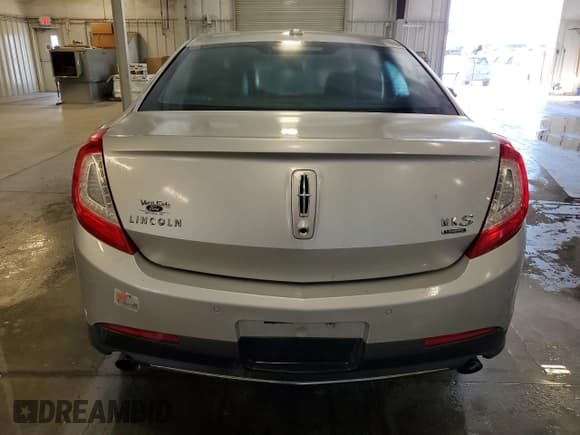 ✅ 2013 Lincoln MKS EcoBoost • VIN: 1LNHL9FT4DG618527 • Lot: 70274905. Wystawiony na Copart z przebiegiem 77 252 mil. Bezpłatny archiwum sprzedaży aukcyjnych z USA i szczegółowy raport historii pojazdu na DreamBid. Zdjęcie 6.