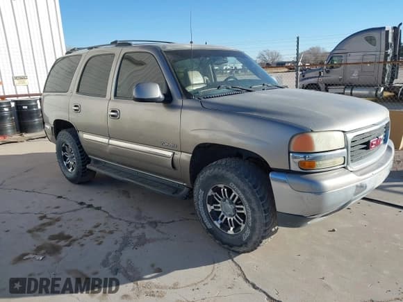 ✅ 2001 GMC Yukon SLT • VIN: 1GKEK13T11R164029 • Lot: 41518776. Listed on IAAI with 329,836 mi. Free auction sales archive from the USA and detailed vehicle history report at DreamBid. Image 1.