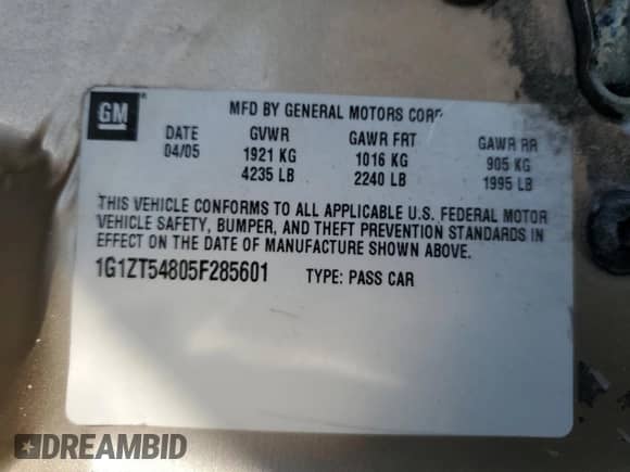 2005 Chevrolet Malibu LS z VIN 1G1ZT54805F285601, wystawiony jako Copart lot #75038064 z przebiegiem 463 039 mil mil oraz Szkoda całkowita • Salvage title. Historia ofert i sprzedaży dostępna na DreamBid. Obrazek 12.