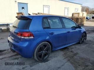 ✅ 2012 Volkswagen Golf R w/Sunroof & Navi • VIN: WVWPF7AJXCW203623 • Лот: 43937245. Опубликован ранее на Copart с пробегом Не указан. Бесплатный доступ к архиву аукционных продаж из США и подробный отчёт об истории автомобиля на DreamBid. Изображение 3.