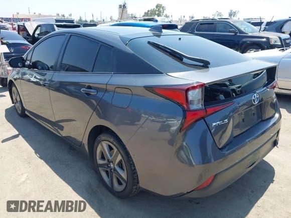 ✅ 2019 Toyota Prius L Eco • VIN: JTDKARFU1K3091222 • Лот: 42473392. Опубликован ранее на IAAI с пробегом 129 858 миль. Бесплатный доступ к архиву аукционных продаж из США и подробный отчёт об истории автомобиля на DreamBid. Изображение 3.