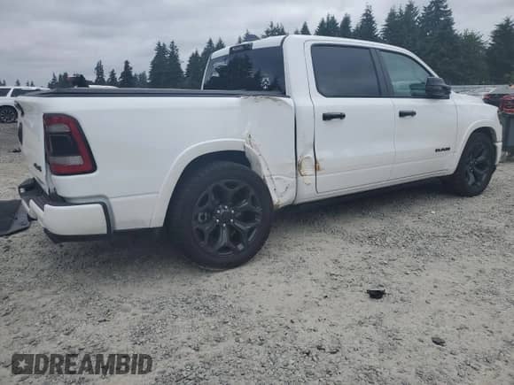 2024 Ram 1500 Limited with VIN 1C6SRFHT2RN122155, listed as a Copart auction lot 60696205 with 8,071 mi miles and Salvage title. Bid and sale history available at DreamBid. Image 3.