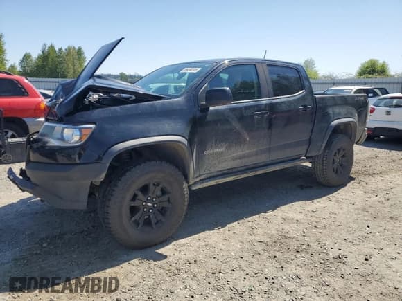 ✅ 2020 Chevrolet Colorado 4WD ZR2 • VIN: 1GCPTEE15L1116748 • Lot: 55498205. Listed on Copart with 60,401 mi. Free auction sales archive from the USA and detailed vehicle history report at DreamBid. Image 1.