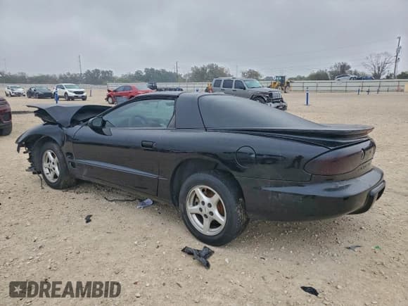 ✅ 1999 Pontiac Firebird Firebird • VIN: 2G2FS22K5X2222920 • Лот: 95157455. Опубликован ранее на Copart с пробегом 210 088 миль. Бесплатный доступ к архиву аукционных продаж из США и подробный отчёт об истории автомобиля на DreamBid. Изображение 2.