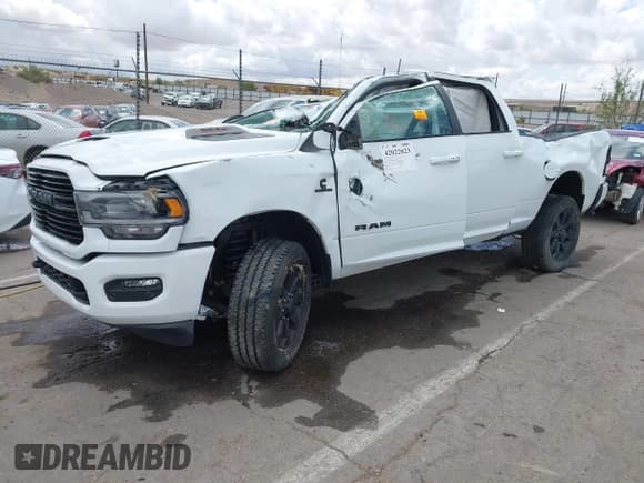 ✅ 2024 Ram 2500 Laramie • VIN: 3C6UR5FL6RG288306 • Lot: 42022023. Listed on IAAI with Not provided. Free auction sales archive from the USA and detailed vehicle history report at DreamBid. Image 16.