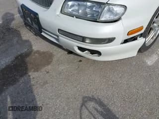 ✅ 1999 Mazda Millenia • VIN: JM1TA2214X1502235 • Lot: 41476231. Wystawiony na IAAI z przebiegiem 201 158 mil. Bezpłatny archiwum sprzedaży aukcyjnych z USA i szczegółowy raport historii pojazdu na DreamBid. Zdjęcie 6.