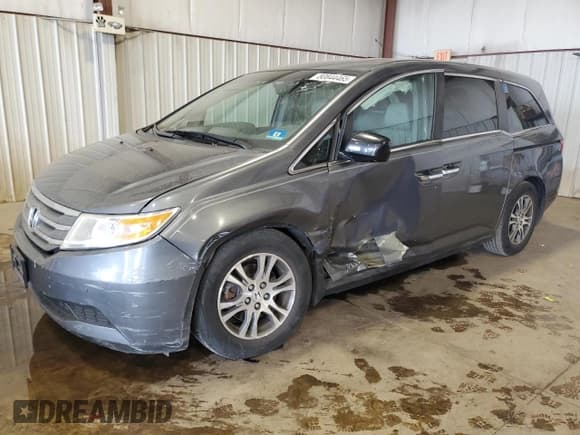 ✅ 2012 Honda Odyssey EX-L • VIN: 5FNRL5H64CB107336 • Лот: 80844465. Опубликован ранее на Copart с пробегом 156 703 миль. Бесплатный доступ к архиву аукционных продаж из США и подробный отчёт об истории автомобиля на DreamBid. Изображение 1.