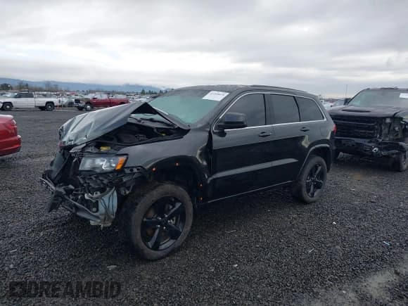 ✅ 2015 Jeep Grand Cherokee Laredo • VIN: 1C4RJFAG0FC154458 • Lot: 41209018. Listed on IAAI with 269,929 mi. Free auction sales archive from the USA and detailed vehicle history report at DreamBid. Image 2.