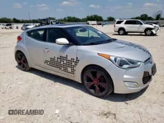 2013 Hyundai Veloster w/Black Int with VIN KMHTC6AD9DU147646, listed as a Copart auction lot 58495585 with 121,781 mi miles and Salvage title. Bid and sale history available at DreamBid. Image 4.