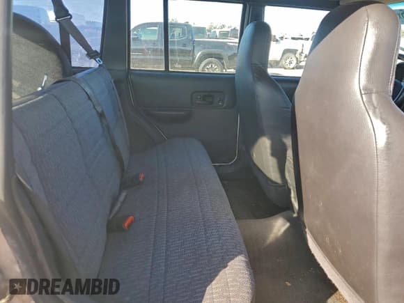 ✅ 2001 Jeep Cherokee Sport • VIN: 1J4FT48S21L614170 • Lot: 94708945. Listed on Copart with 173,209 mi. Free auction sales archive from the USA and detailed vehicle history report at DreamBid. Image 11.