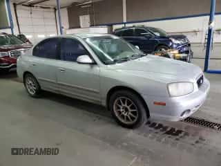 2001 Hyundai Elantra GLS z VIN KMHDN45D61U069948, wystawiony jako Copart lot #69787253 z przebiegiem 251 000 mil mil oraz Szkoda całkowita • Salvage title. Historia ofert i sprzedaży dostępna na DreamBid. Obrazek 4.