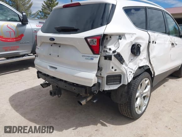 ✅ 2019 Ford Escape Titanium • VIN: 1FMCU9J99KUC21963 • Лот: 42186434. Опубликован ранее на IAAI с пробегом 60 578 миль. Бесплатный доступ к архиву аукционных продаж из США и подробный отчёт об истории автомобиля на DreamBid. Изображение 20.