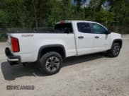 ✅ 2022 Chevrolet Colorado 4WD Z71 • VIN: 1GCGTDEN2N1280894 • Лот: 68010564. Опубликован ранее на Copart с пробегом 22 517 миль. Бесплатный доступ к архиву аукционных продаж из США и подробный отчёт об истории автомобиля на DreamBid. Изображение 3.