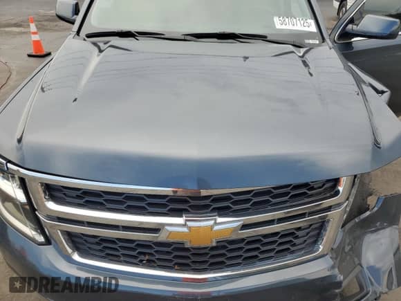 2020 Chevrolet Tahoe LT z VIN 1GNSKBKC7LR117538, wystawiony jako Copart lot #82119935 z przebiegiem 100 701 mil mil oraz Czysty tytuł • Clean title. Historia ofert i sprzedaży dostępna na DreamBid. Obrazek 12.