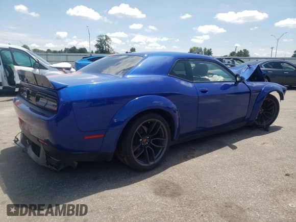 2018 Dodge Challenger R/T с VIN 2C3CDZBT7JH328126, выставлен на аукционе Copart как лот 65752625 с пробегом 70 548 миль миль и Списание • Salvage title. История ставок и продаж доступна на DreamBid. Изображение 3.