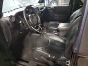 ✅ 2014 Jeep Wrangler Sahara • VIN: 1C4GJWBG8EL302134 • Lot: 87063845. Wystawiony na Copart z przebiegiem 135 749 mil. Bezpłatny archiwum sprzedaży aukcyjnych z USA i szczegółowy raport historii pojazdu na DreamBid. Zdjęcie 7.