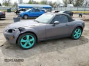 ✅ 2006 Mazda MX-5 Miata Touring • VIN: JM1NC25F060122162 • Lot: 51412785. Wystawiony na Copart z przebiegiem 81 510 mil. Bezpłatny archiwum sprzedaży aukcyjnych z USA i szczegółowy raport historii pojazdu na DreamBid. Zdjęcie 1.