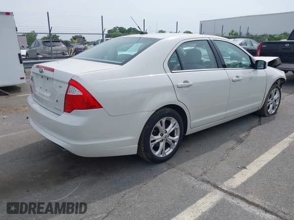 ✅ 2012 Ford Fusion SE • VIN: 3FAHP0HG7CR368279 • Lot: 42288523. Listed on IAAI with 176,808 mi. Free auction sales archive from the USA and detailed vehicle history report at DreamBid. Image 4.