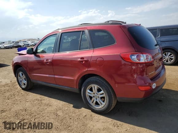 ✅ 2012 Hyundai Santa Fe GLS • VIN: 5XYZGDAB2CG124635 • Lot: 62453324. Listed on Copart with 134,219 mi. Free auction sales archive from the USA and detailed vehicle history report at DreamBid. Image 2.