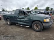 ✅ 2001 Ford F-150 XL • VIN: 1FTRX17L41NA90489 • Lot: 67060015. Listed on Copart with 143,360 mi. Free auction sales archive from the USA and detailed vehicle history report at DreamBid. Image 4.