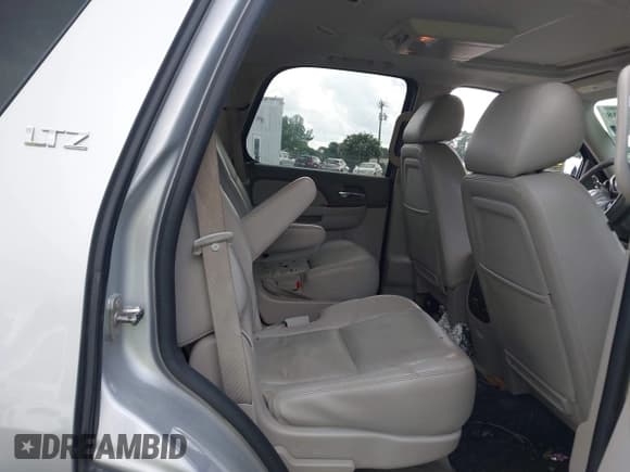 ✅ 2014 Chevrolet Tahoe LTZ • VIN: 1GNSCCE05ER124530 • Лот: 42702038. Опубликован ранее на IAAI с пробегом 167 569 миль. Бесплатный доступ к архиву аукционных продаж из США и подробный отчёт об истории автомобиля на DreamBid. Изображение 8.