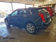 ✅ 2012 Cadillac SRX Performance Collection • VIN: 3GYFNEE39CS659777 • Lot: 94455295. Listed on Copart with 181,120 mi. Free auction sales archive from the USA and detailed vehicle history report at DreamBid. Image 2.