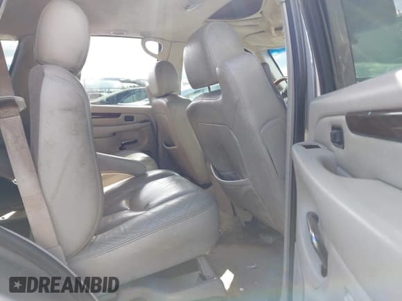 ✅ 2003 Cadillac Escalade • VIN: 1GYEC63T33R278259 • Lot: 43611203. Wystawiony na IAAI z przebiegiem 294 061 mil. Bezpłatny archiwum sprzedaży aukcyjnych z USA i szczegółowy raport historii pojazdu na DreamBid. Zdjęcie 8.