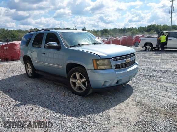 2011 Chevrolet Tahoe LTZ with VIN 1GNSCCE01BR315857, listed as a IAAI auction lot 43455908 with 263,775 mi miles and . Bid and sale history available at DreamBid. Image 1.