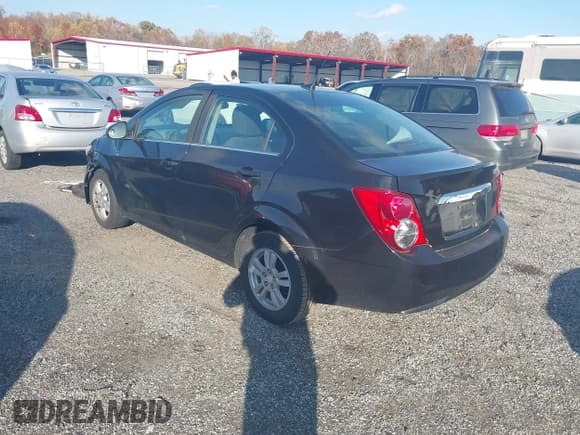 ✅ 2014 Chevrolet Sonic LT • VIN: 1G1JC5SH0E4228312 • Lot: 43579562. Listed on IAAI with 136,210 mi. Free auction sales archive from the USA and detailed vehicle history report at DreamBid. Image 3.