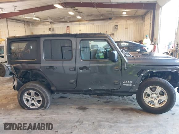 ✅ 2018 Jeep Wrangler Unlimited Sport S • VIN: 1C4HJXDG1JW252998 • Лот: 43225778. Опубликован ранее на IAAI с пробегом 89 720 миль. Бесплатный доступ к архиву аукционных продаж из США и подробный отчёт об истории автомобиля на DreamBid. Изображение 13.