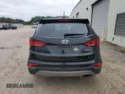 ✅ 2018 Hyundai Santa Fe 2.4L • VIN: 5XYZT3LB4JG569961 • Lot: 84625555. Listed on Copart with 131,480 mi. Free auction sales archive from the USA and detailed vehicle history report at DreamBid. Image 6.