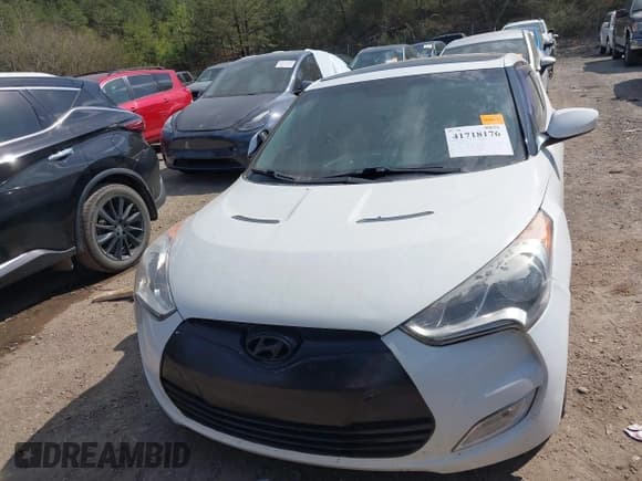 ✅ 2014 Hyundai Veloster • VIN: KMHTC6AD1EU217707 • Lot: 41718176. Wystawiony na IAAI z przebiegiem 191 306 mil. Bezpłatny archiwum sprzedaży aukcyjnych z USA i szczegółowy raport historii pojazdu na DreamBid. Zdjęcie 6.